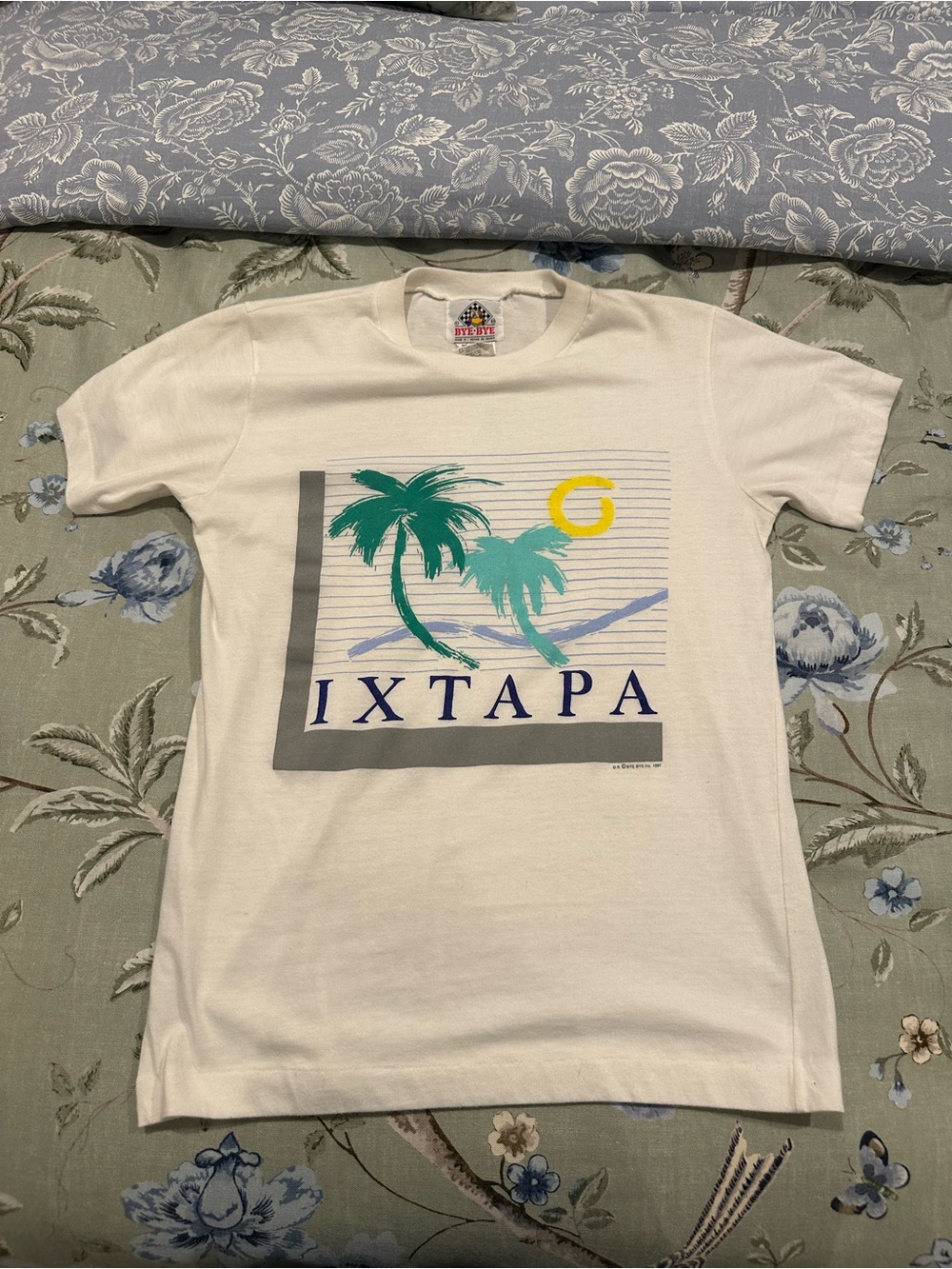 Vintage 1987 Men’s Graphic Tee in Cream with Palm Print